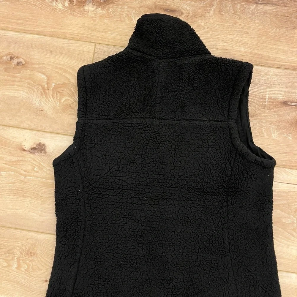 The North Face Black Sherpa Vest, size medium